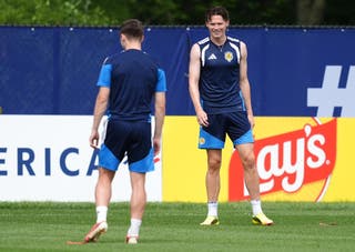 McTominay (right) was back in training on Friday